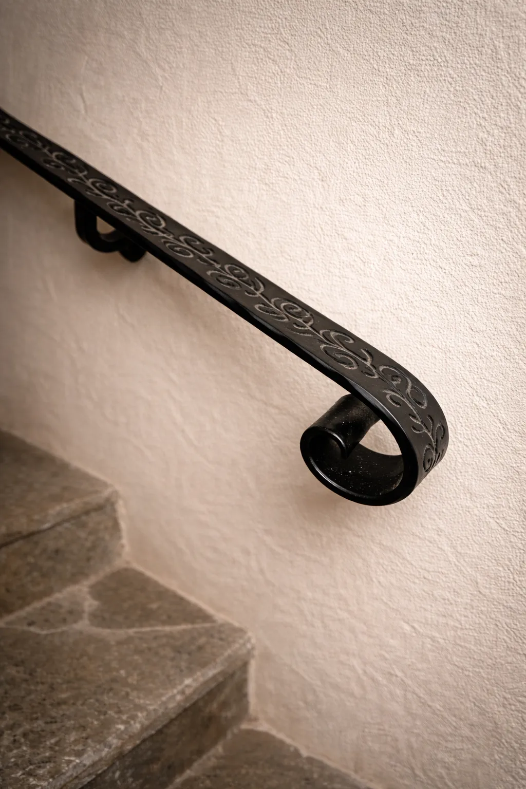 Wrought-iron handrail detail at Cumbres de Lores
